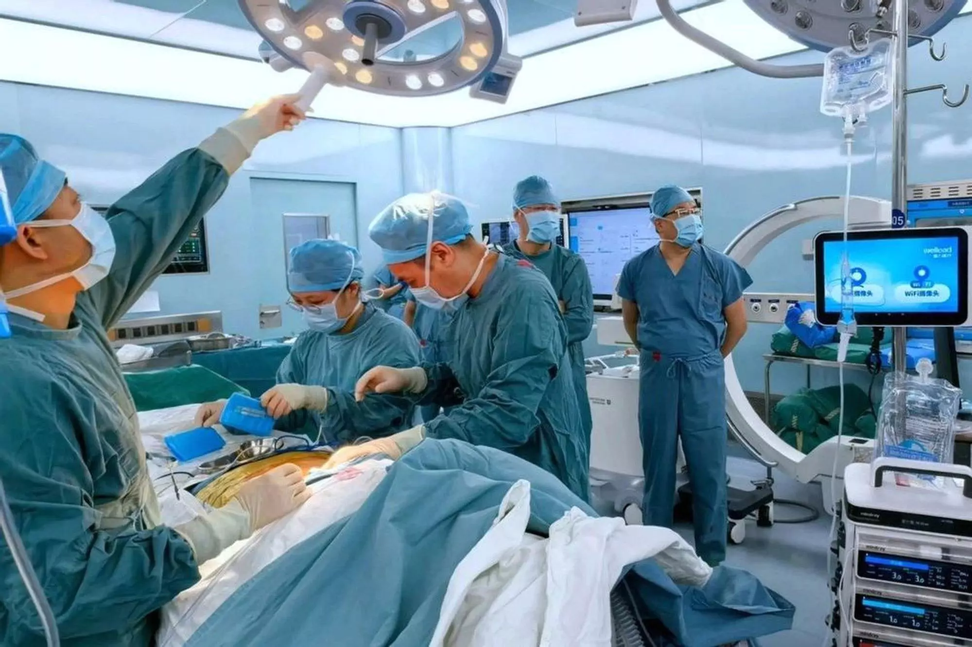 Following a pioneering surgery conducted by Fudan University in Shanghai, four individuals with spinal cord injuries regained limb movement within hours. Photo: Fudan University
