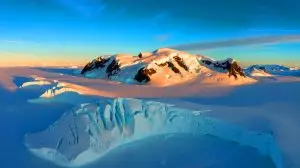 Illustration of the Gamburtsev Mountains hidden beneath Antarctica's ice sheets. Image generated by AI.