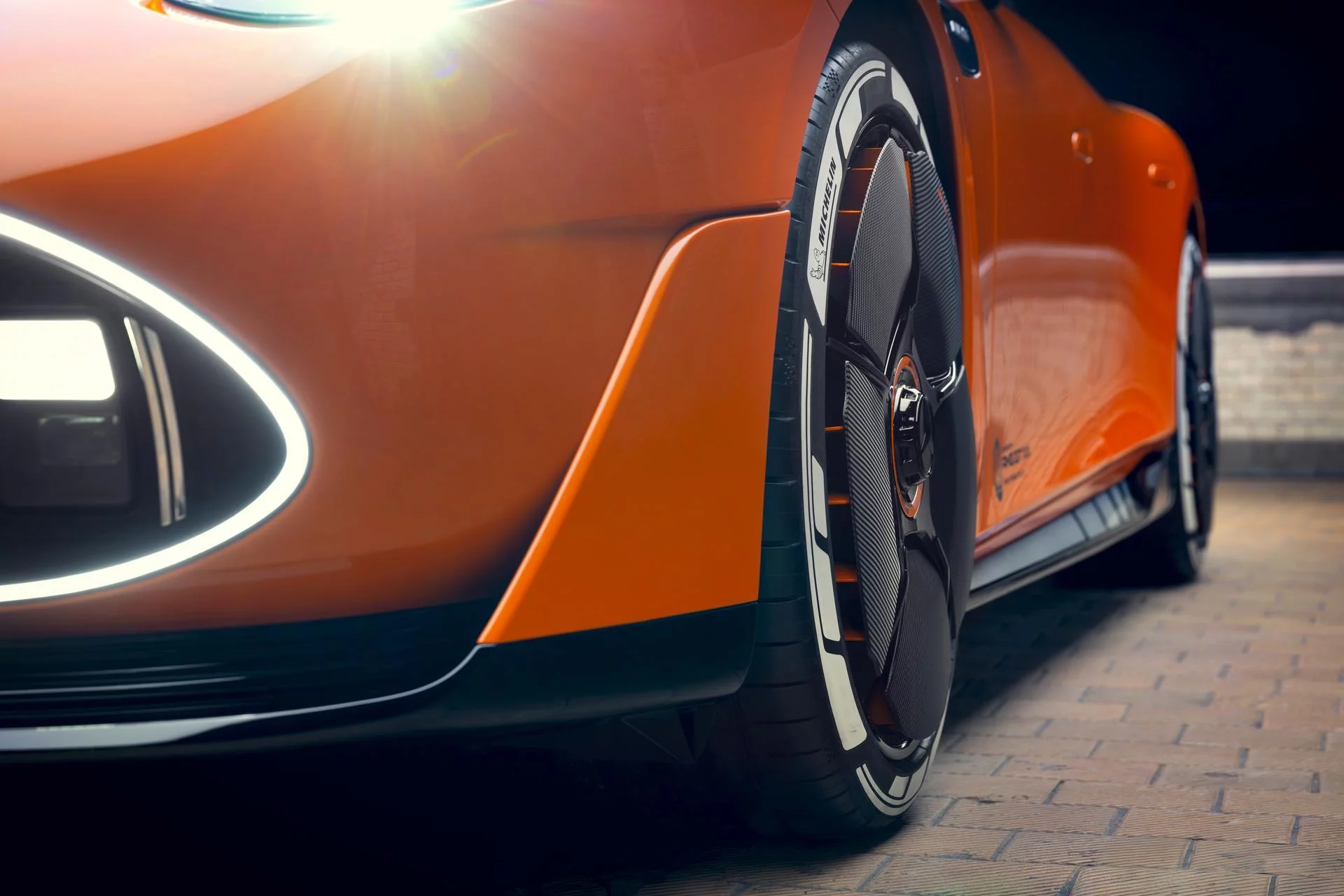 The AMG Concept GT XX's wheel fins can retract or extend to channel cooling air to the brakes