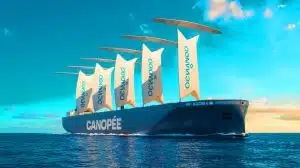 Illustration of the Canopée cargo vessel utilizing wind-assisted propulsion technology. Image generated by AI.