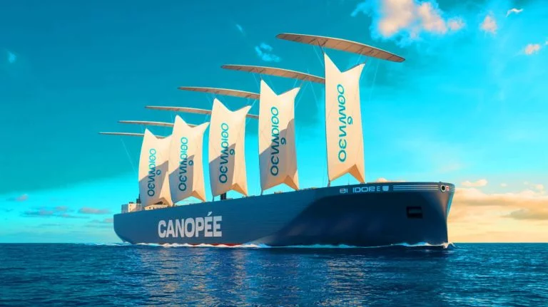 Illustration of the Canopée cargo vessel utilizing wind-assisted propulsion technology. Image generated by AI.