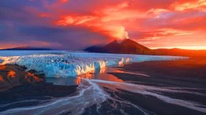 Illustration of the potential reawakening of dormant subglacial volcanoes due to glacial melting, created by artificial intelligence.