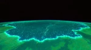 Illustration of a bioluminescent phytoplankton bloom captured by NASA satellites off Australia's southern coast.