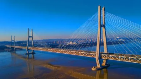 Illustration of the Changtai Yangtze River Bridge spanning over the Yangtze River in Jiangsu province, China.