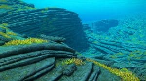 Massive Hidden CO2 Sponge Discovered Beneath Ocean Floor, Offering New Hope in Climate Change Fight Illustration of ancient lava rubble acting as a natural carbon dioxide reservoir beneath the ocean floor.